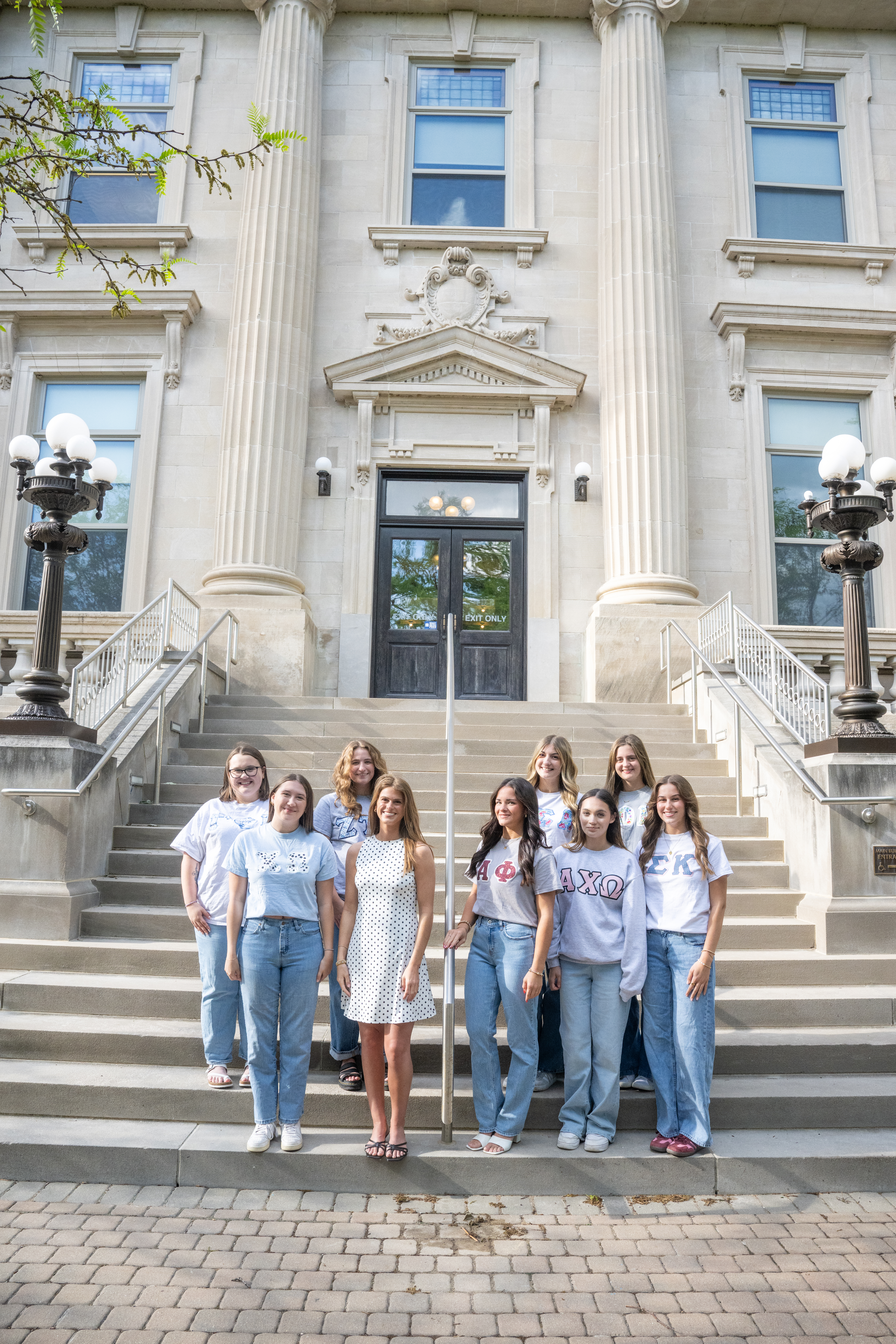 Group photo of the 2026 Panhellenic Presidents in front of Normal Hall.